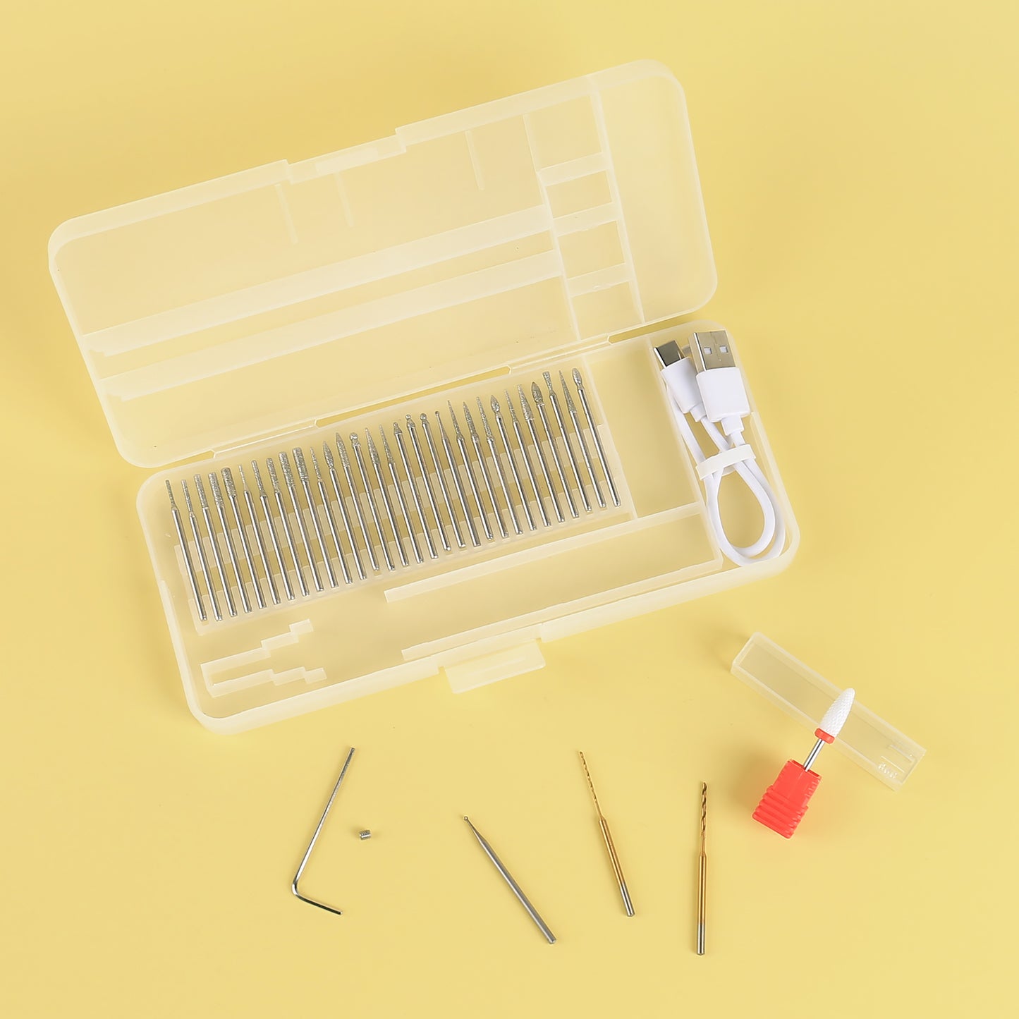 D2-002 Engraving tool accessories including 30 bits, drills, L wrench, USB cable, and storage case.