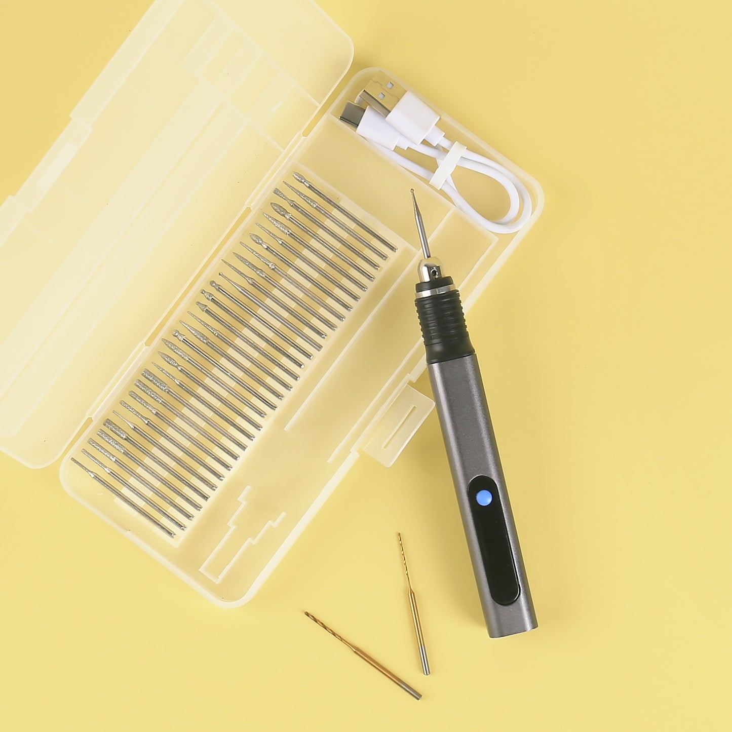 D2-002 Engraving pen with 30 bits, drill bits, and USB charging cable in a storage case – perfect for DIY engraving projects.